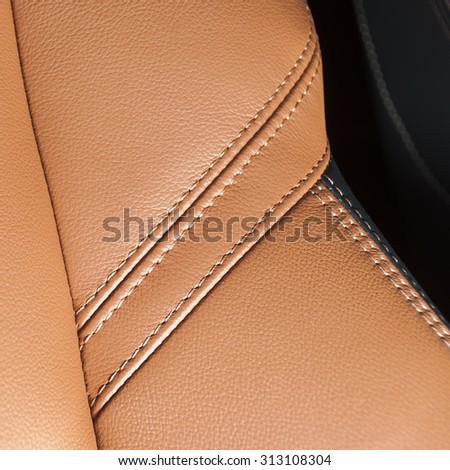 orange car leather  interior details  with stitch