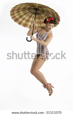 Model with umbrella isolated on white background