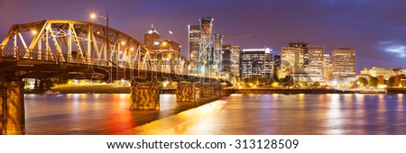 The skyline of Portland, Oregon at night. Photographed from across the Willamette River.