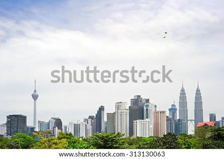 Skyline of Kuala Lumpur downtown in the day. Malaysia Royalty-Free Stock Photo #313130063