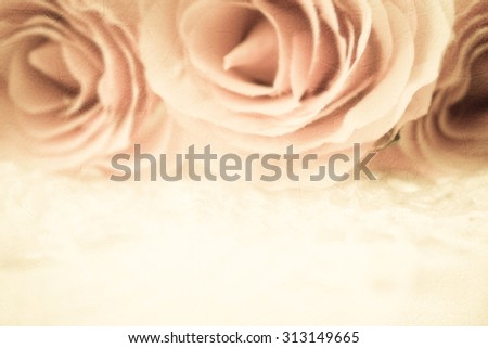 roses flowers in vintage color style on mulberry paper texture for romantic background