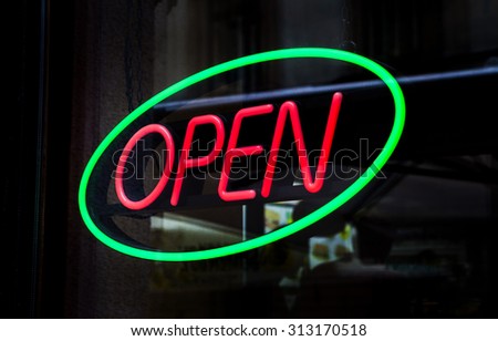 An Open sign in a shop.