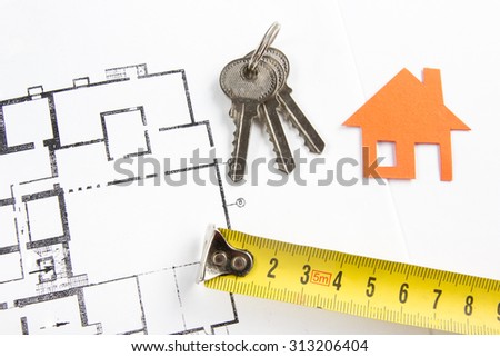 Model house, construction plan for house building, keys, divider compass and clipboard. Real Estate Concept. Top view.