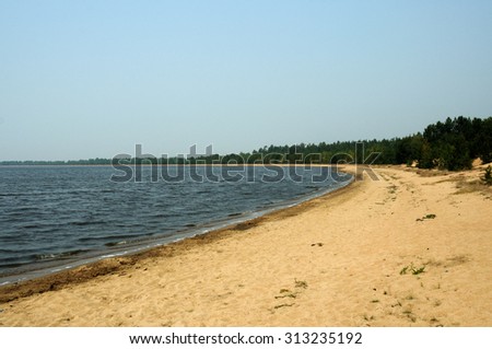 sandy lake shore, photo toned
