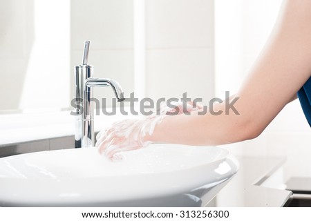 Washing, women's hand