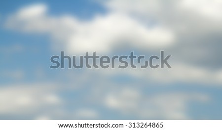 blurred background, blue sky and white clouds