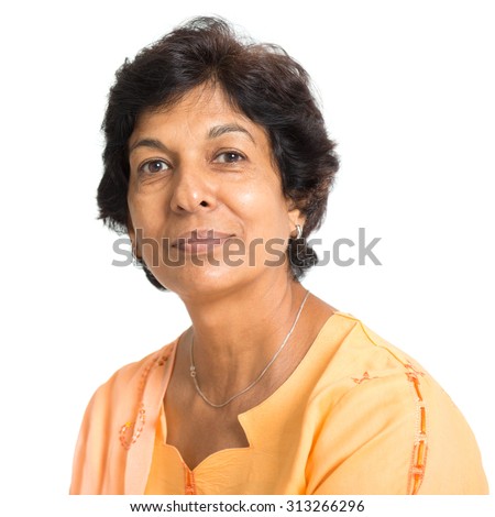 Portrait of a 50s Indian mature woman smiling, isolated on white background. Royalty-Free Stock Photo #313266296