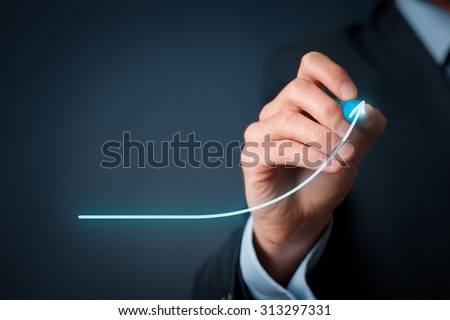 Development and growth concept. Businessman plan growth and increase of positive indicators in his business.  Royalty-Free Stock Photo #313297331