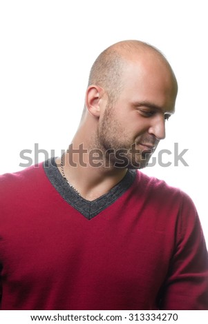 a handsome young man with winter clothes isolated over a white background