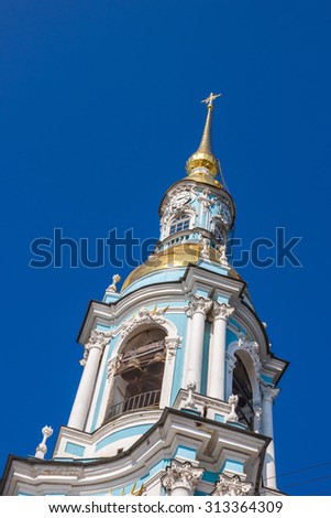belfry of St. Nicholas Naval Cathedral in the Baroque style with wires in the picture.  Saint Petersburg, Russia 


