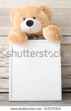 vintage frame and teddy Bear