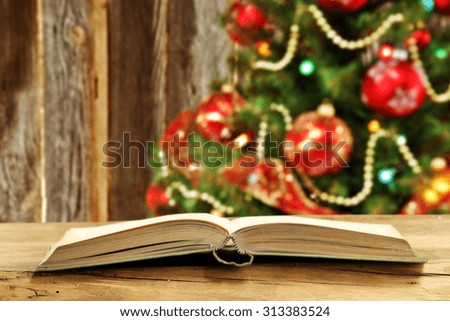 open book xmas tree and wall of wood 