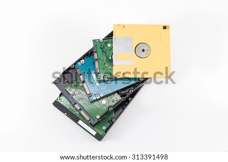 Stack hard disk drives. Close-up. Isolated on white background