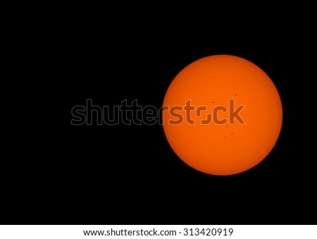 Sunspots. Near the edges, you can see turbulence on the surface of the sun. This is not noise, but rather detail on the sun's surface.