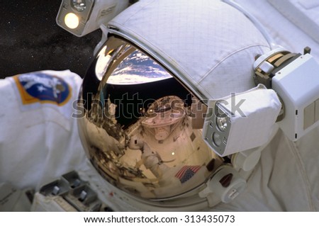 Astronaut on space mission. Elements of this image furnished by NASA.
