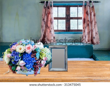 Artificial flower vase on wooden table top over Bedroom background/ interior  home improvement