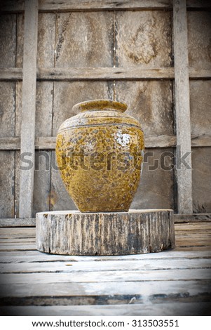 pottery on old wooden background