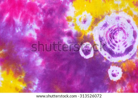 colourful tie dyed pattern on cotton fabric abstract background. 