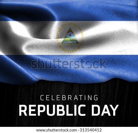 Nicaragua flag and Celebrating Republic Day Typography on wood background