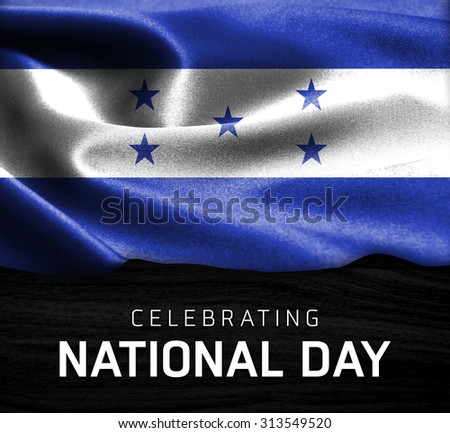 Honduras flag and Celebrating National Day Typography on wood background