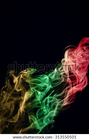 Movement of smoke, Abstract red and green and brown smoke on black background, smoke background,red and green and brown ink background, red ,green, brown
