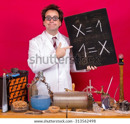 Professor in the laboratory shows a blackboard with mathematical formula. Math genius with his scientific discovery in the laboratory. Mad teacher at the table on red background.