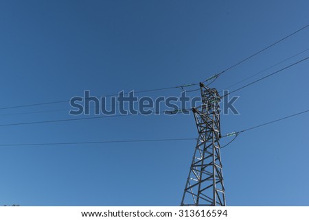 Power line isolated against the blue sky
