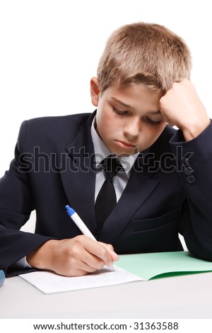 The boy, books and exercise book on a white background. Concept for "Back to school"