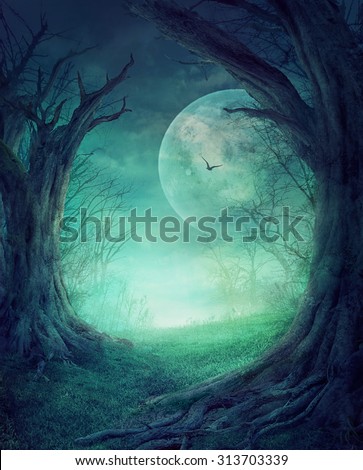 Halloween design - Spooky tree. Horror background with autumn valley with woods, spooky tree and full moon. Space for your Halloween holiday text.
