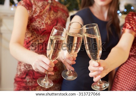 three glasses of champagne close-up women at a party