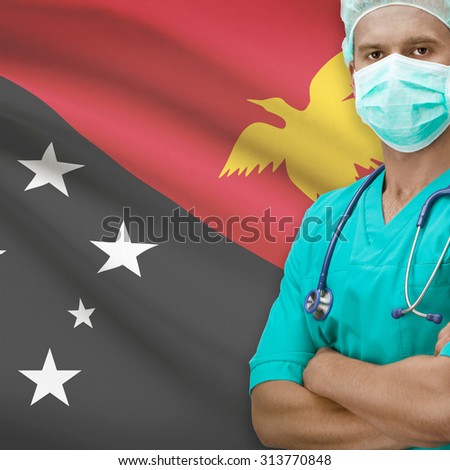Surgeon with flag on background - Papua New Guinea