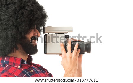 Afro man filming