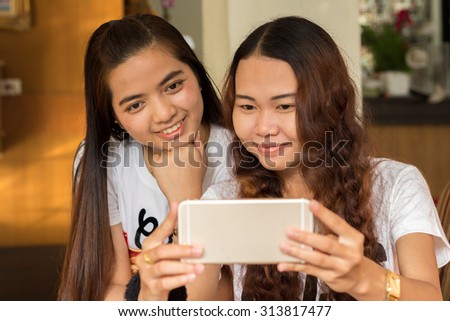 Vacation time the asian girls are taking selfie together