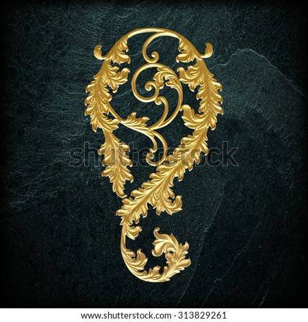 Ornament elements, vintage gold floral designs on black slate background or texture