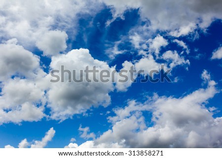 wonderful plentifully clouds on fresh light blue sky background