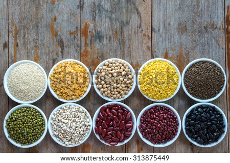 Prepared  Multi color Pulses for cooking on the old plank Royalty-Free Stock Photo #313875449
