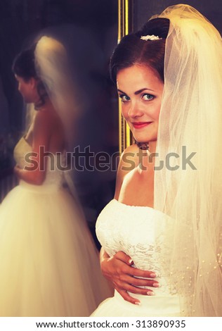 Beautiful bride preparing to ceremony vintage style filtered picture