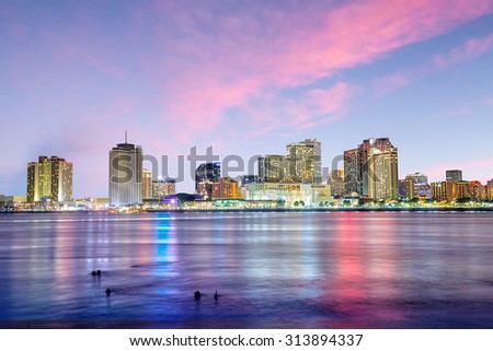 Downtown New Orleans, Louisiana and the Mississippi River at twilight