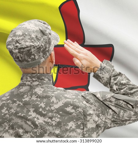 Soldier saluting to Canadian province flag conceptual series - Nunavut