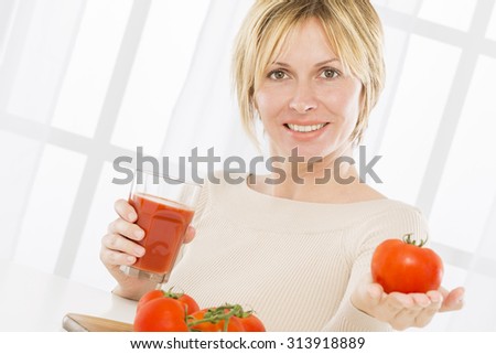 Forty years woman and tomato