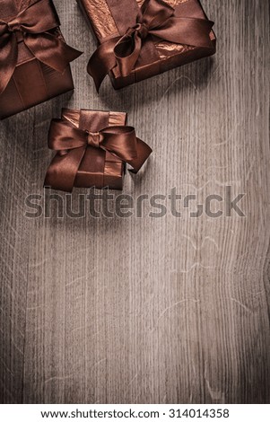 Gift boxes wrapped in glittery crumpled paper celebration concept.