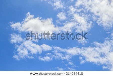 White clouds in the blue sky for any design