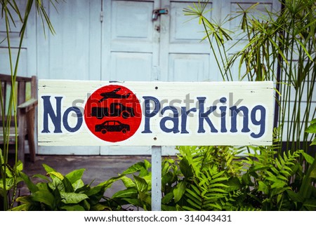 Signs no parking wooden
