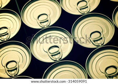 Closeup of a group of aluminium cans. Royalty-Free Stock Photo #314059091
