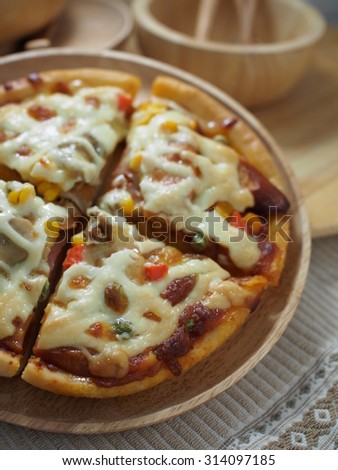  focus of pizza on wood