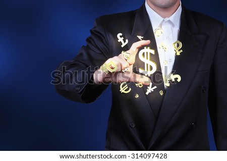 Currency gold symbols in a man hand