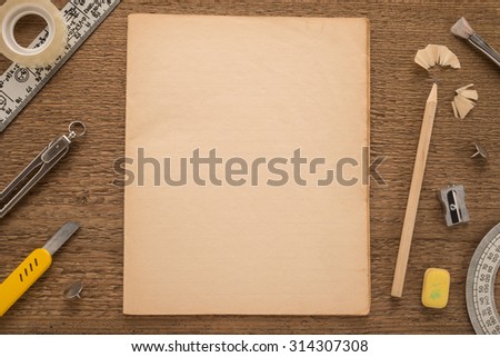 School supplies on wooden background 

