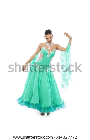 Beautiful young woman in a ballroom dress