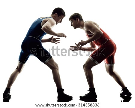 two caucasian wrestlers wrestling men on isolated silhouette white background Royalty-Free Stock Photo #314358836