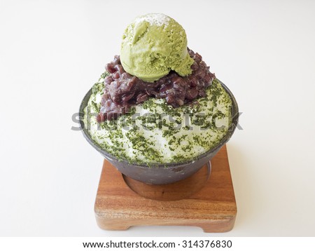 Japanese green tea ice dessert with red bean on top with green tea icecream Royalty-Free Stock Photo #314376830